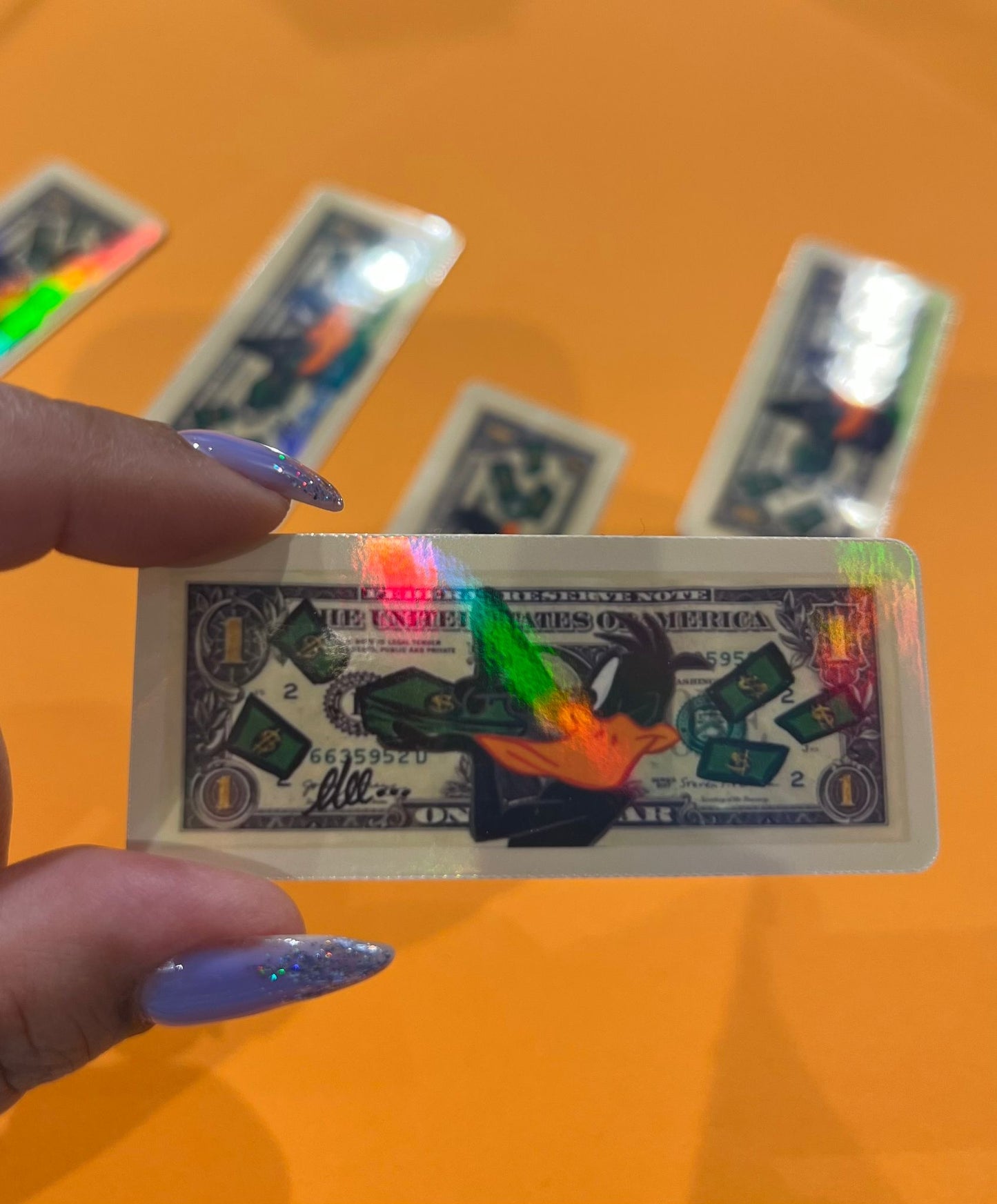 Dollar bill ( Daffy Duck ) holographic sticker